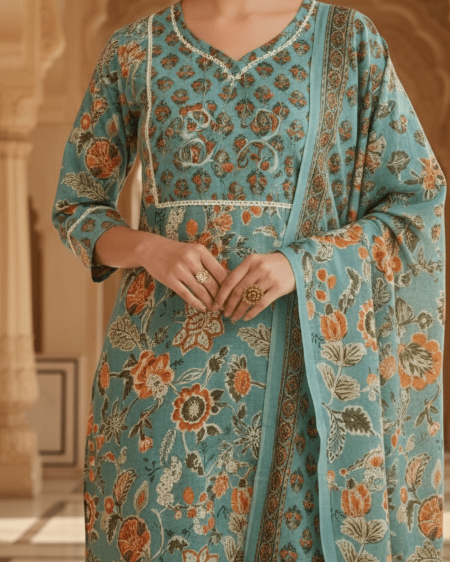 floral sea green cotton kurta with patterned straight trouser paired with dupatta