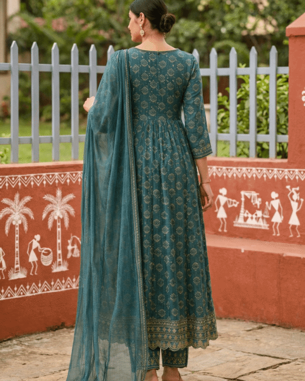 teal floral cotton kurta set with printed straight trousers with dupatta