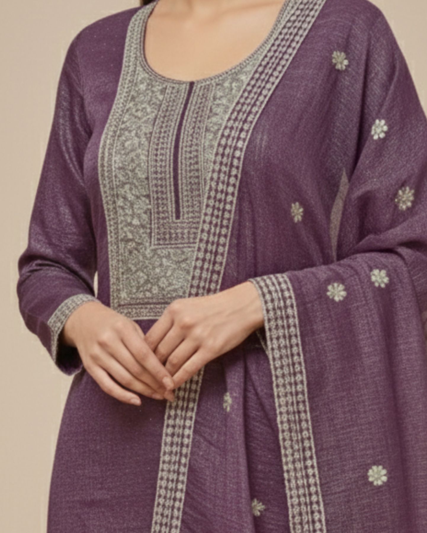 semi stitched plum purple organza suit featuring fine zari and sequin embroidery