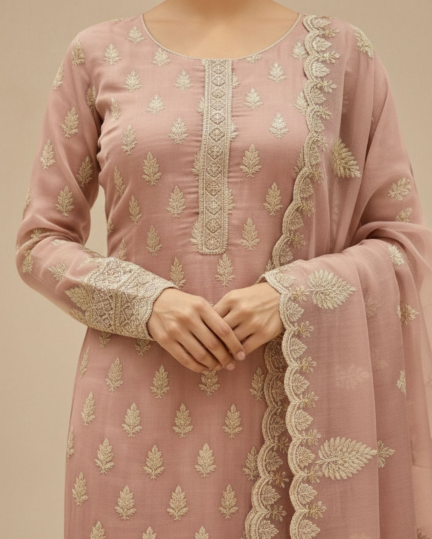 semi stitched dusty rose organza with delicate ivory thread and sequin floral motifs suit material