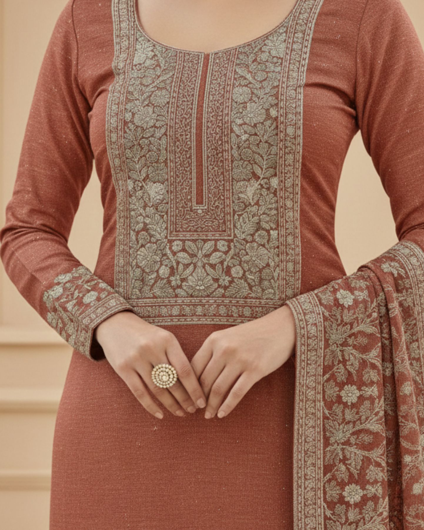 semi stitched deep wine red muslin silk suit embellished with scattered rhinestone butti and intricate golden zari embroidery