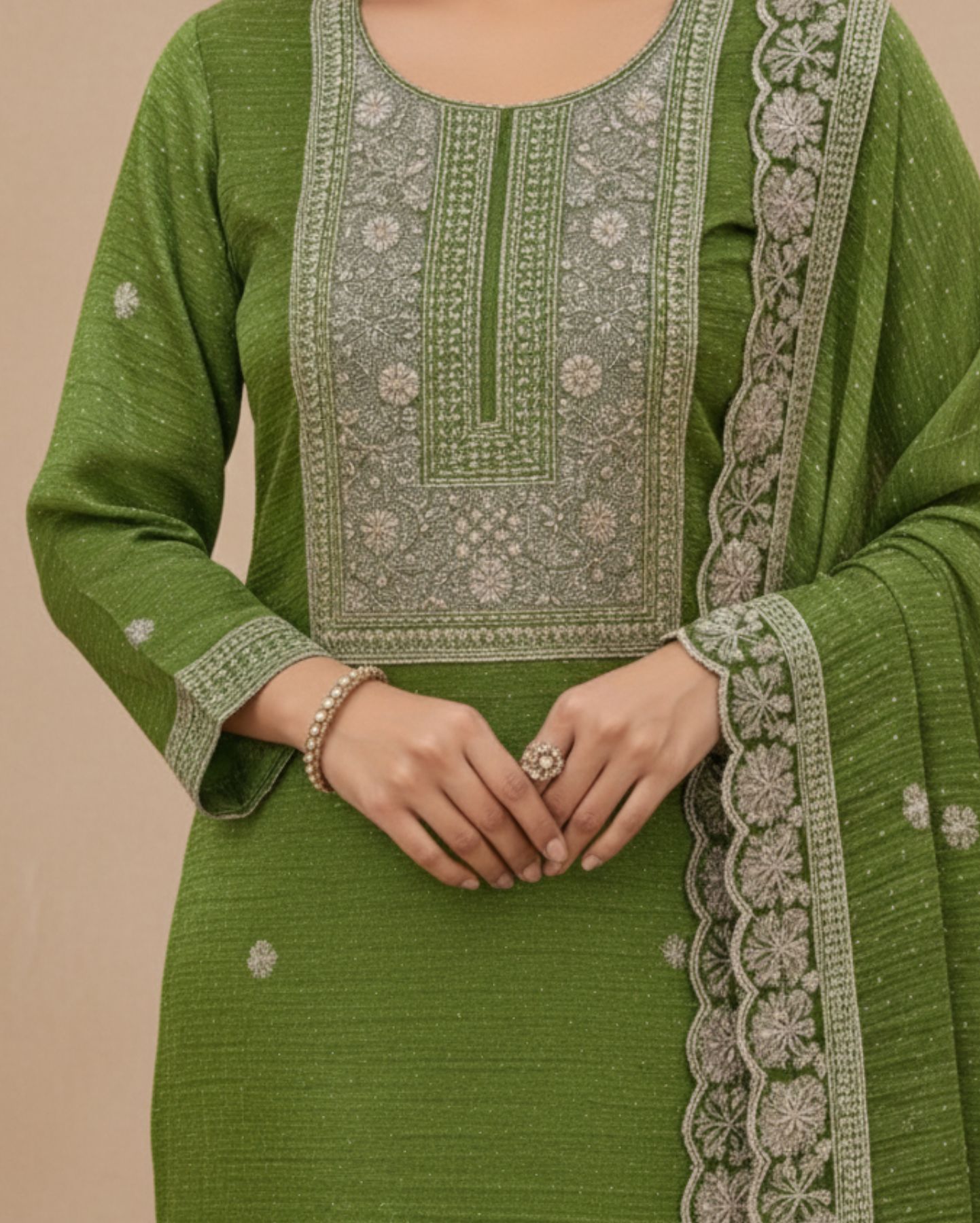 semi stitched a refreshing pista green organza suit with subtle shimmer and scattered stone embellishments