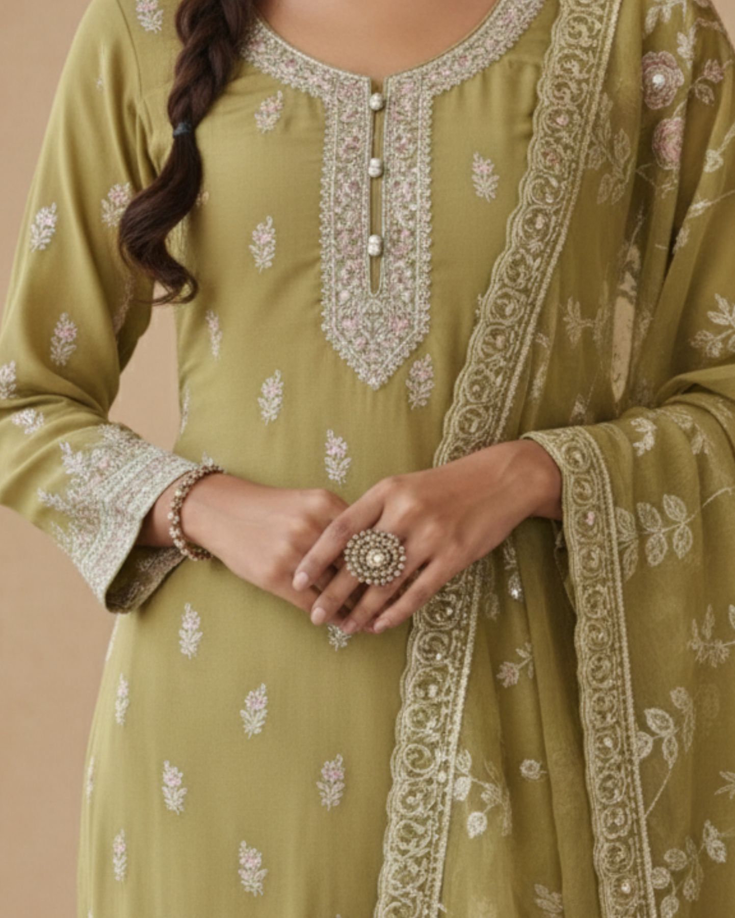 semi stitched olive green pure organza suit with delicate pastel thread and sequin neckline embroidery