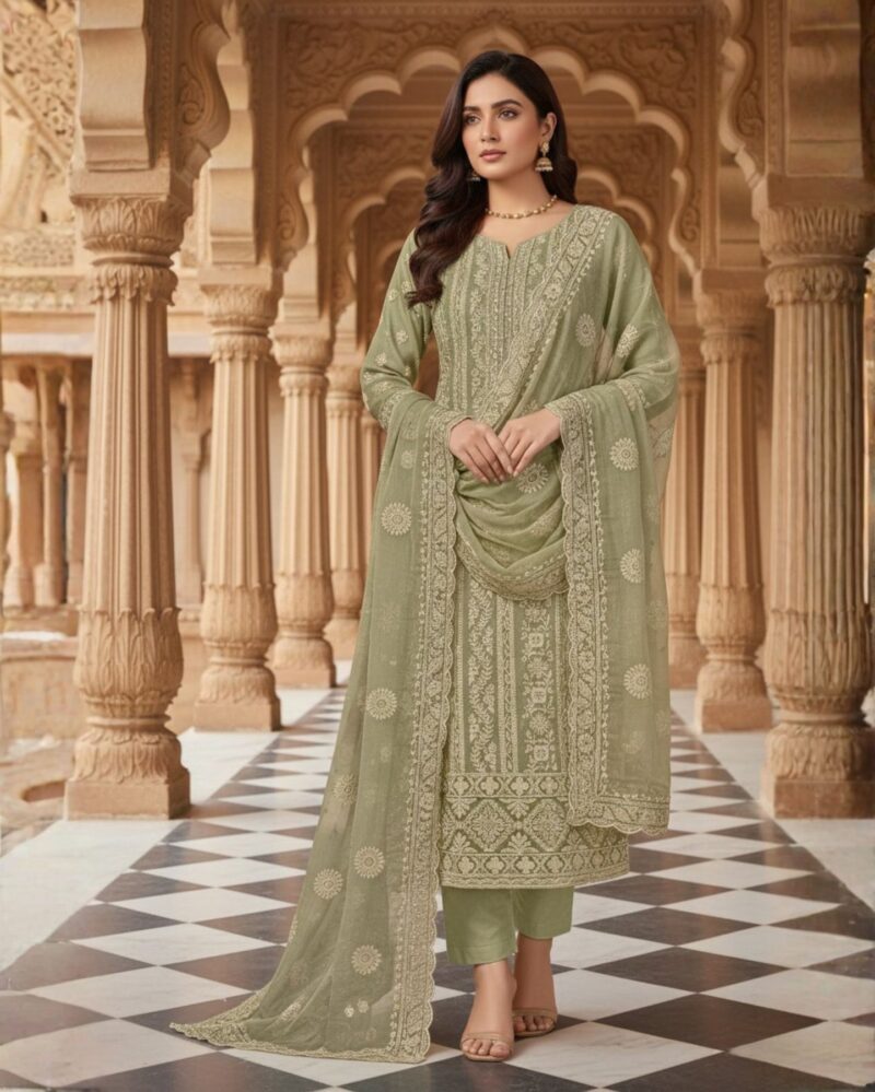 unstitched pastel pistachio green chiffon suit with intricate ivory threadwork and subtle sequin sparkle