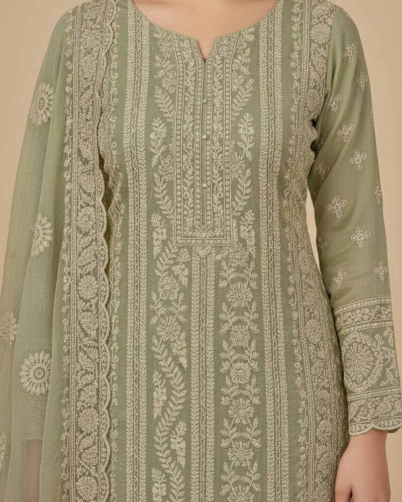 unstitched pastel pistachio green chiffon suit with intricate ivory threadwork and subtle sequin sparkle