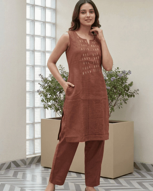 light pink cotton kurta pant set with subtle thread embroidery