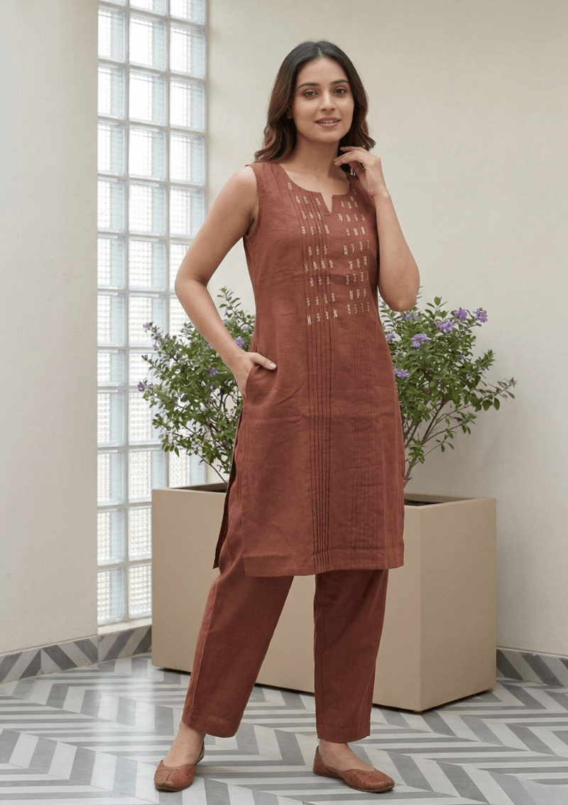 light pink cotton kurta pant set with subtle thread embroidery