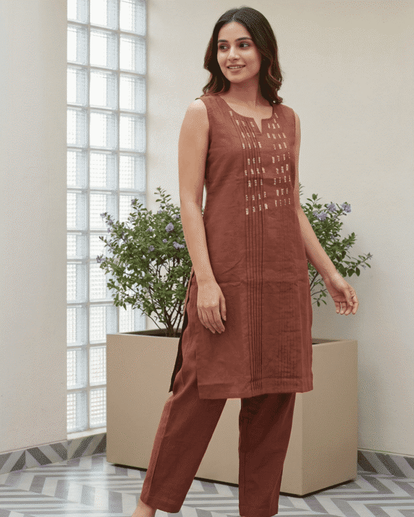 light pink cotton kurta pant set with subtle thread embroidery