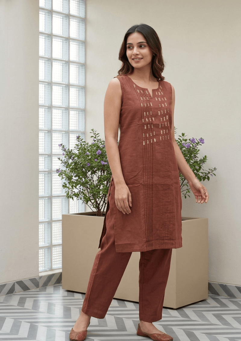 light pink cotton kurta pant set with subtle thread embroidery