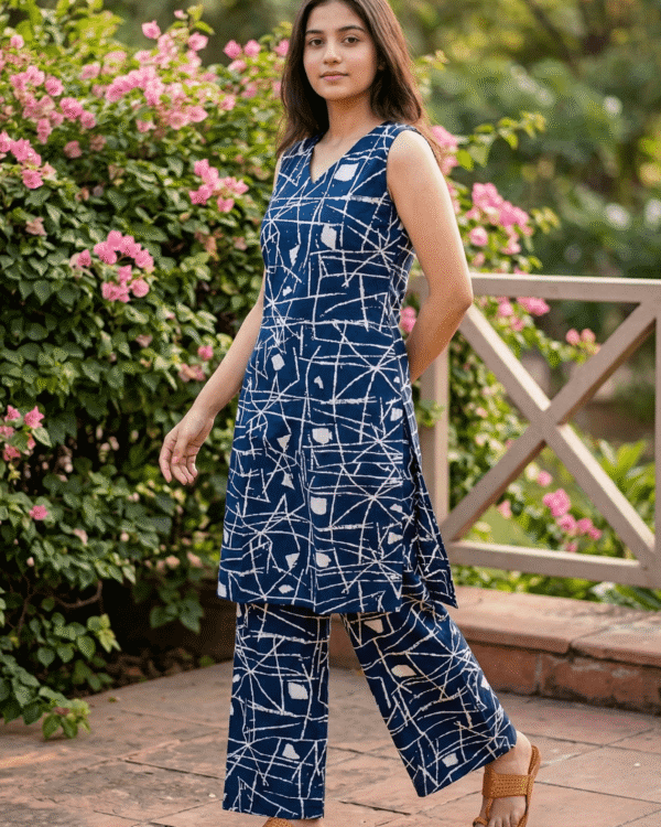 navy blue cotton kurta pant set with abstract white print