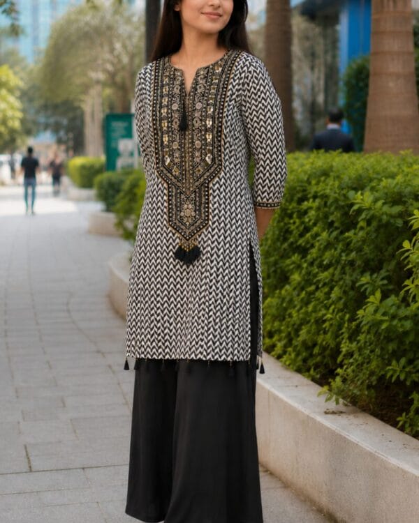 Black Muslin Subtle Embroidered and Printed Kurta Pant Set